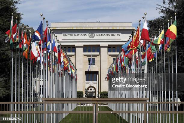 Flags stand outside the United Nations building in Geneva, Switzerland, on Tuesday, May 14, 2019. While the Swiss city has largely recovered from the...