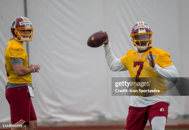 Washington Redskins quarterback Josh Woodrum watches quarterback Dwayne Haskins at the Redskins Rookie Mini Camp, on May 11 at Inova Sports...