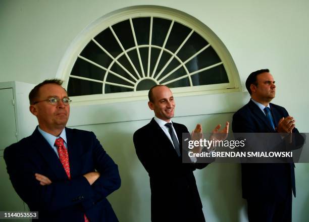 Presidential advisor Stephen Miller , White House acting Chief of Staff Mick Mulvaney , and White House Social Media Director Dan Scavino listen as...