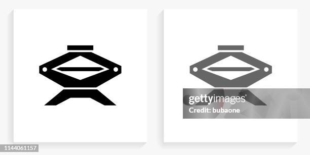 car jack black and white square icon - car jack stock illustrations