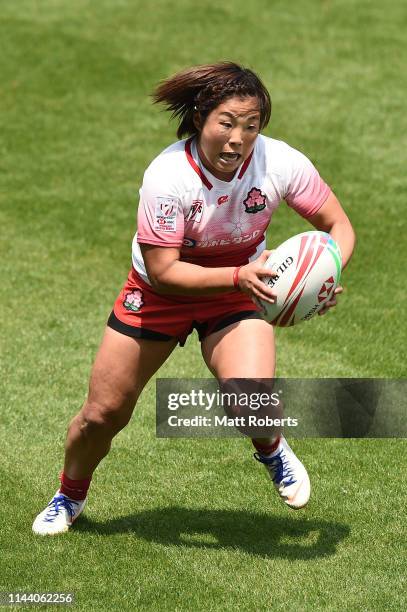 Yume Okuroda of Japan runs with the ball during theChallenge Trophy semifinal between Japan and Fiji on day two of the HSBC Women's Rugby Sevens...