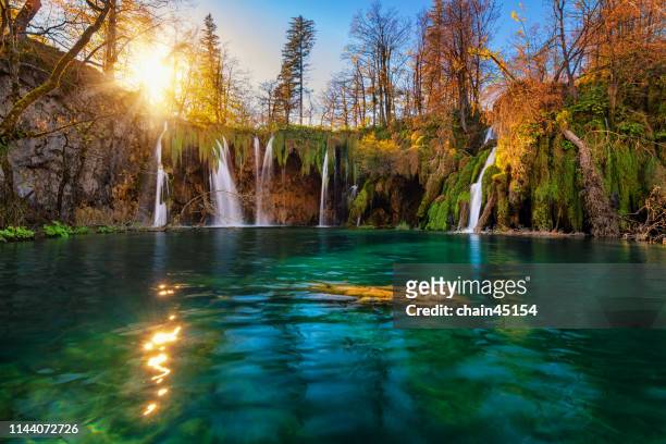 waterfall in heaven autumn during sunrise. - plitvice lakes national park stock pictures, royalty-free photos & images