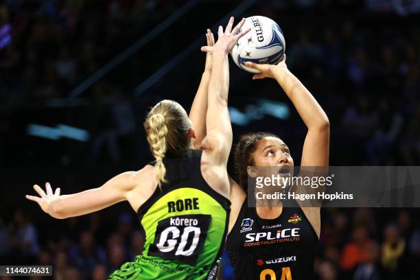 Abigail Latu-Meafou of the Magic shoots under pressure from Katrina Rore of the Pulse during the ANZ Premiership netball match between the Central...