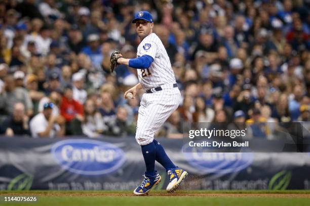 Travis Shaw of the Milwaukee Brewers throws the first base in the seventh inning against the Los Angeles Dodgers at Miller Park on April 20, 2019 in...