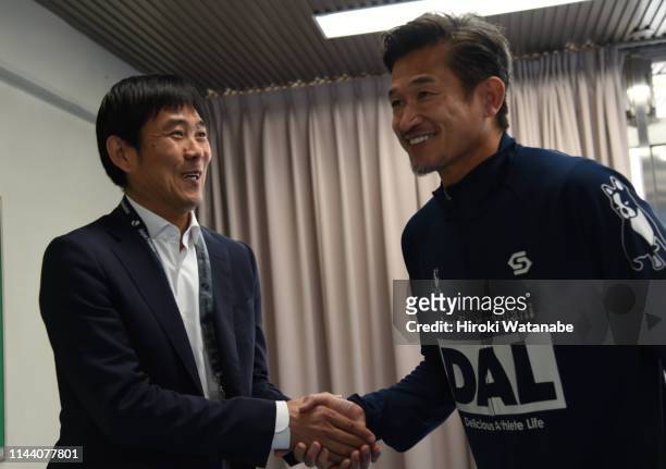 Hajime Moriyasu, coach of Japan and Kazuyoshi Miura of Yokohama FC shake hands prior to the J.League J2 match between Yokohama FC and JEF United...