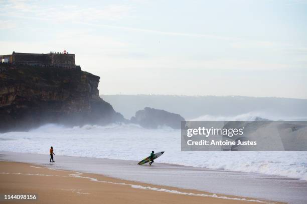 Hugo Vau going back to the lineup during his Round One Heat 1 of the Nazare Challenge in Nazare, Portugal.