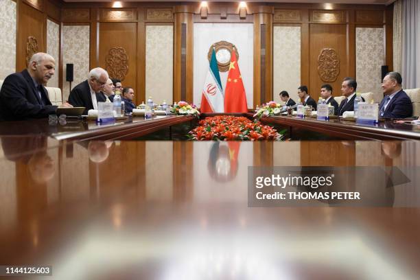 Iran's Foreign Minister Mohammad Javad Zarif meets China's Foreign Minister Wang Yi at the Diaoyutai State Guesthouse in Beijing on May 17, 2019.