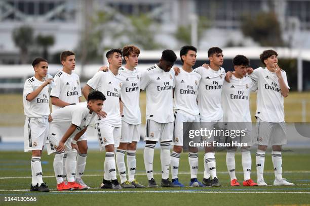 Players of Real Madrid huddle during the penalty shoot out in the U16 Kirin Lemon Cup final between Real Madrid and FC Tokyo at Yanagishima Sports...