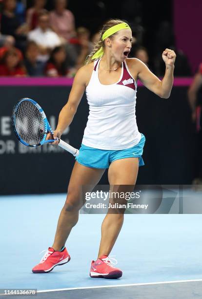 Yulia Putintseva of Kazakhstan celebrates taking the first set against Johanna Konta of Great Britain during the Fed Cup World Group II Play-Off...