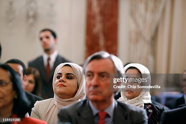 Audience members listen to U.S. President Barack Obama deliver a speech on Mideast and North Africa policy in the Ben Franklin Room at the State...