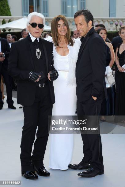 Karl Lagerfeld, Carine Roitfeld and amfAR Chairman Kenneth Cole attends amfAR's Cinema Against AIDS Gala during the 64th Annual Cannes Film Festival...