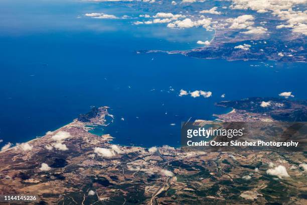 strait of gibraltar, aerial view of the separation between the continents of europe and africa and the union of the mediterranean sea and the atlantic ocean. - straits of gibraltar stock pictures, royalty-free photos & images