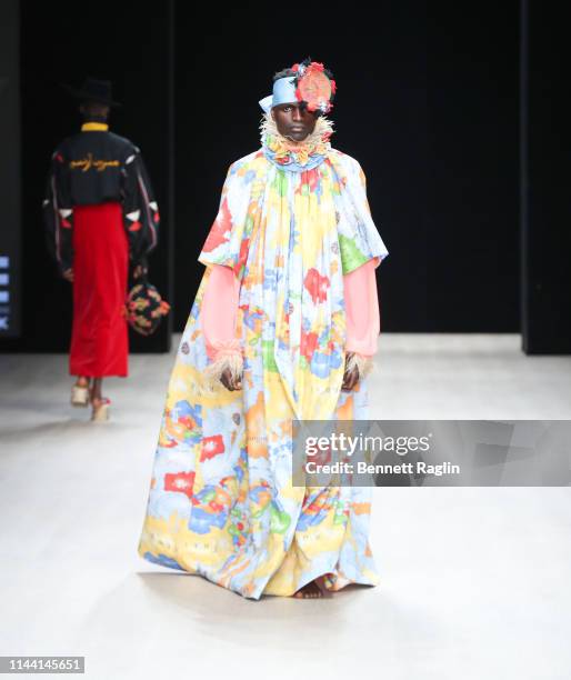 Model walks the runway wearing Maison Artc during Arise Fashion Week on April 20, 2019 in Lagos, Nigeria.