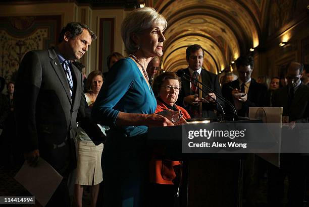 Secretary of Health and Human Services Kathleen Sebelius speaks as U.S. Sen. Sherrod Brown and U.S. Sen. Barbara Mikulski listen during a news...