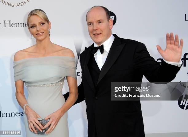 Charlene Wittstock and Prince Albert II of Monaco attend amfAR's Cinema Against AIDS Gala during the 64th Annual Cannes Film Festival at Hotel Du Cap...