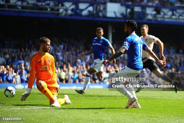 Theo Walcott of Everton scores his side's fourth goal during the Premier League match between Everton FC and Manchester United at Goodison Park on...