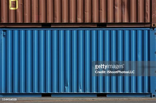 blue and brown cargo storage containers - cargo container texture stock pictures, royalty-free photos & images