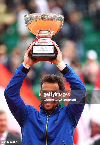 Fabio Fognini of Italy holds aloft the winners trophy after his straight sets victory against Dusan Lajovic of Serbia in the men's singles final...