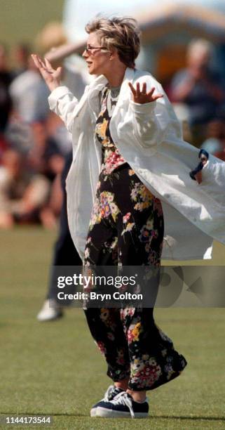 Julia Carling, a British journalist, television presenter and former wife of England rugby captain Will Carling, gestures during a celebrity cricket...