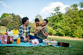 Happy family spending a spring day on picnic