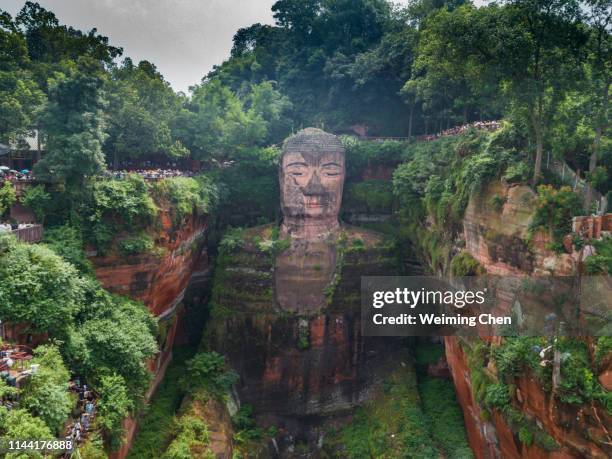 leshan giant buddha - giant buddha stock pictures, royalty-free photos & images