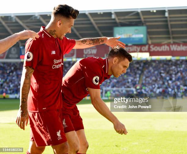 James Milner of Liverpool celebrating after scoring from the penalty spot during the Premier League match between Cardiff City and Liverpool FC at...