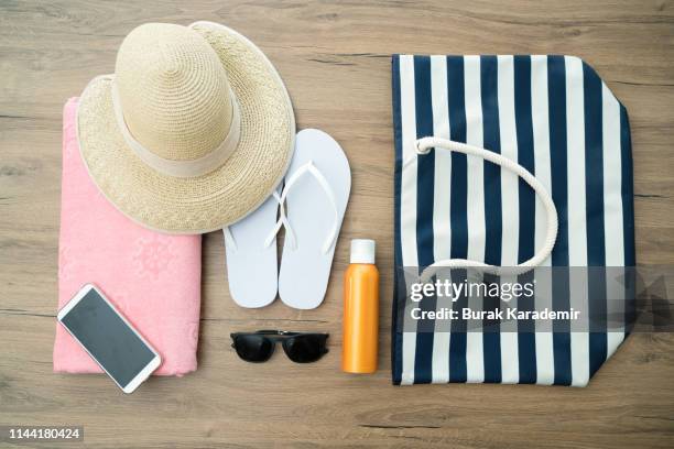 beach outfit - towel lined stock pictures, royalty-free photos & images