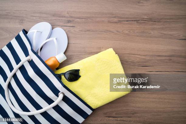 beach outfit - beach bag overhead stock pictures, royalty-free photos & images