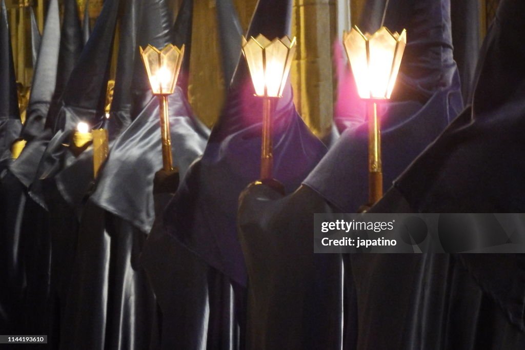 Nazarenes and penitents in a religious procession