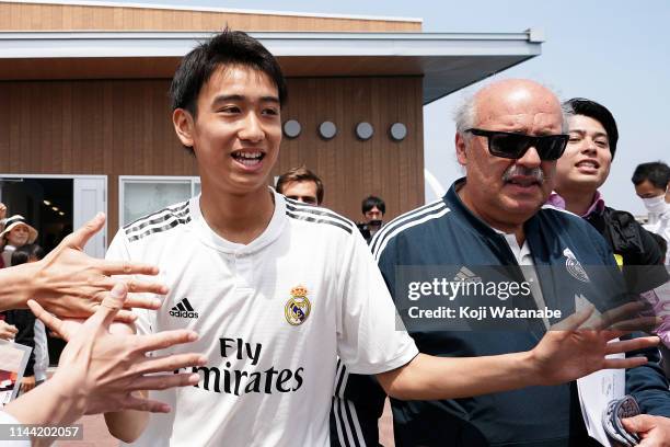 Takuhiro Nakai of Real Madrid high fives with fans prior to the U16 Kirin Lemon Cup final between Real Madrid and FC Tokyo at Yanagishima Sports Park...