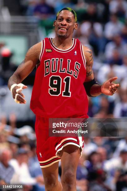 Dennis Rodman of the Chicago Bulls reacts to a play against the Utah Jazz during Game Six of the 1998 NBA Finals on June 14, 1998 at the Delta Center...