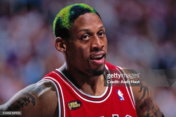 Dennis Rodman of the Chicago Bulls looks on against the Utah Jazz during Game Two of the 1998 NBA Finals on June 5, 1998 at the Delta Center in Salt...
