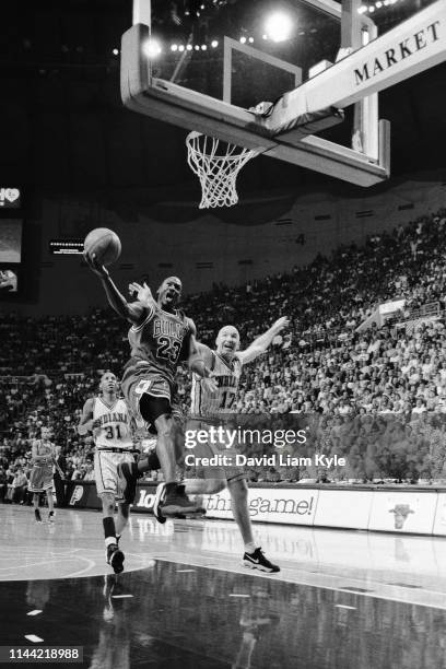 Michael Jordan of the Chicago Bulls goes to the basket during Game Five of the 1999 NBA Eastern Conference Semifinals against the Indiana Pacers on...