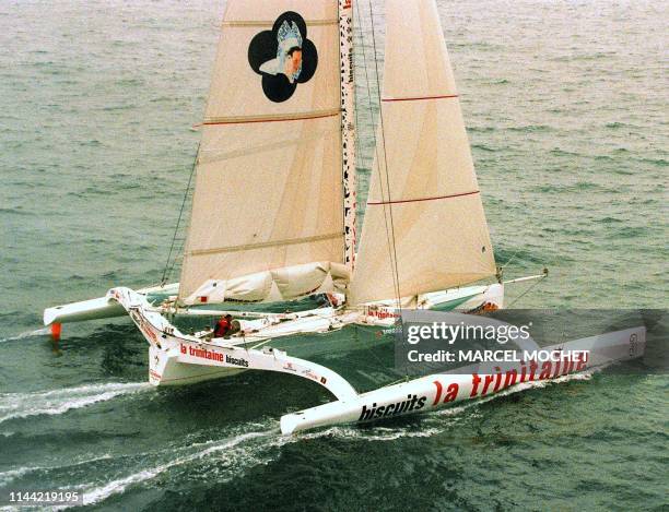 Photo prise le 08 novembre du navigateur Marc Guillemot à la barre de son trimaran 60 pieds "La Trinitaine" , lors du départ de la "Route du Rhum"...