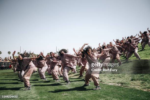Choir members perform at Sunday Service during the 2019 Coachella Valley Music And Arts Festival on April 21, 2019 in Indio, California.