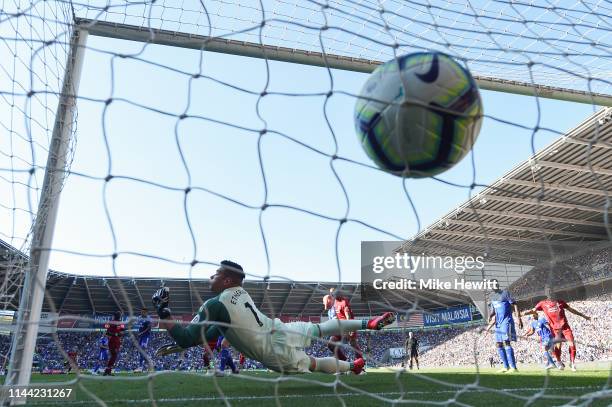 Neil Etheridge of Cardiff City fails to stop a shot from Georginio Wijnaldum of Liverpool during the Premier League match between Cardiff City and...