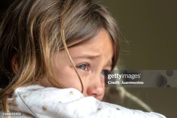 sad crying little girl - girl sad stock pictures, royalty-free photos & images