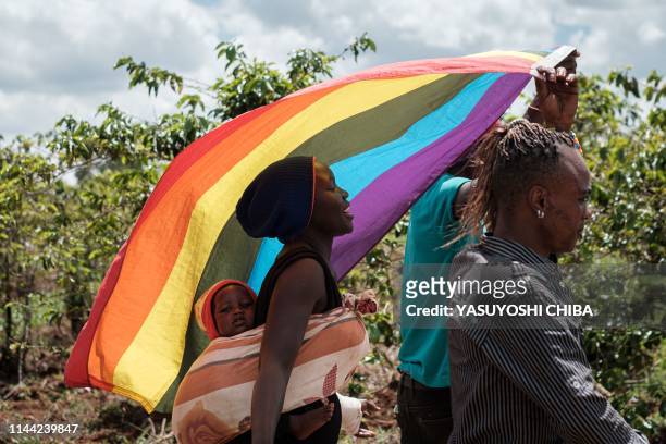 Refugees from South Sudan, Uganda and DR Congo walk on the way to their protest to demand their protection at the office of the United Nations High...