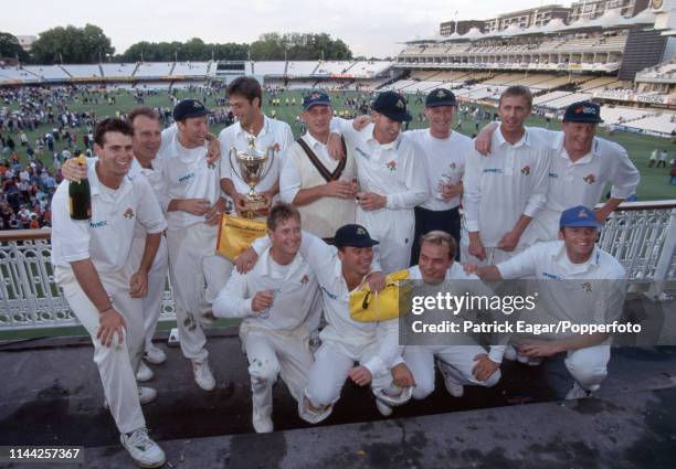 Captain Mike Watkinson and the Lancashire team celebrate after winning the Benson and Hedges Cup Final between Kent and Lancashire by 35 runs at...