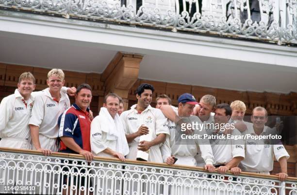 Lancashire captain Wasim Akram stands with his team on the pavilion balcony after Lancashire won the NatWest Bank Trophy Final between Derbyshire and...