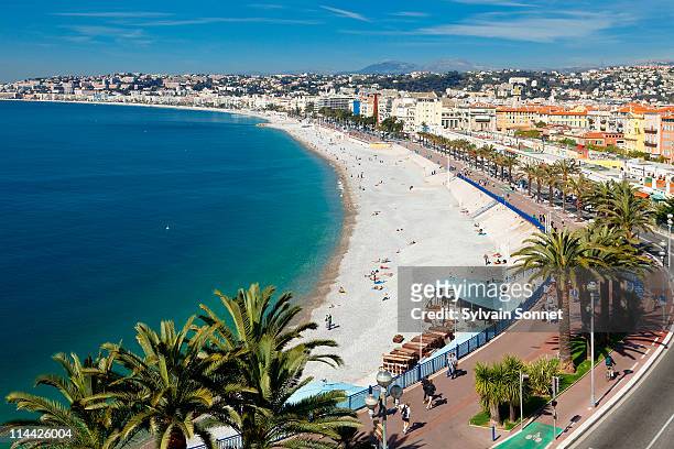 beach and promenade des anglais in nice - nice france stock pictures, royalty-free photos & images