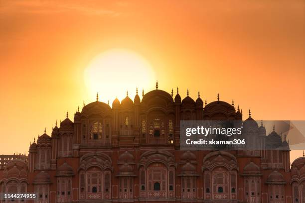 beautiful sunset over hawa mahal at pink city jaipur rajasthan india - amer fort stock pictures, royalty-free photos & images