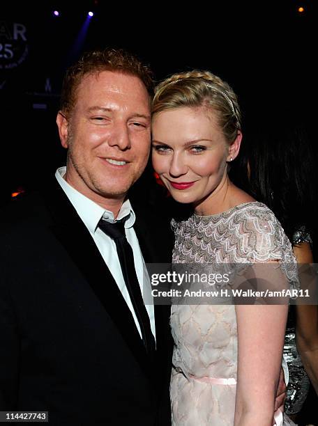 Relativity Media's Ryan Kavanaugh and Kirsten Dunst attend amfAR's Cinema Against AIDS Gala during the 64th Annual Cannes Film Festival at Hotel Du...