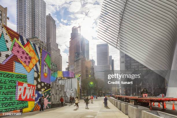 skyscrapers, oculus and street art in world trade center square, lower manhattan, new york city, usa - street art around the world stock pictures, royalty-free photos & images
