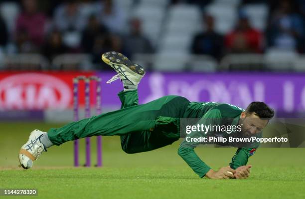 Junaid Khan of Pakistan catches Joe Denly of England during the fourth one-day international between England and Pakistan at Trent Bridge on May 17,...
