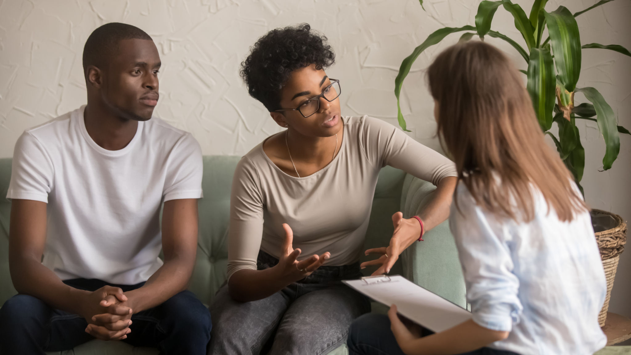 Unhappy african wife talking to psychologist complaining on bad relationship Unhappy african wife talking to psychologist complaining on bad relationship