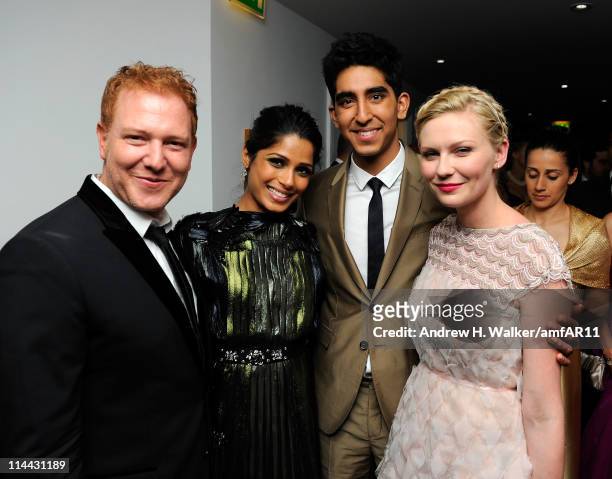 Ryan Kavanaugh, Freida Pinto, Dev Patel and Kirsten Dunst attend amfAR's Cinema Against AIDS Gala after party during the 64th Annual Cannes Film...