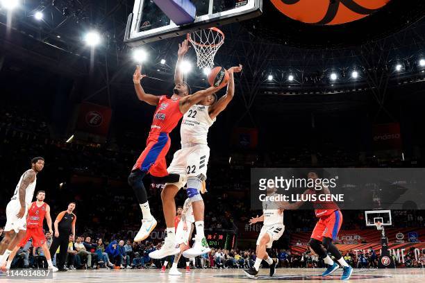 Real Madrid's Cape Verdean centre Walter Tavares challenges CSKA Moscow's US guard Cory Higgins during the EuroLeague semi-final basketball match...