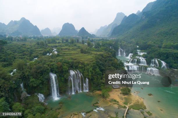 aerial view of ban gioc waterfall in cao bang province, vietnam - vietnam jungle stock pictures, royalty-free photos & images