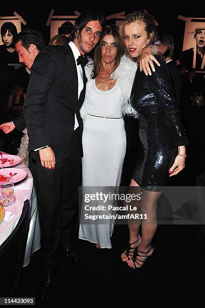 Vladimir Restoin Roitfeld, Carine Roitfeld and Eva Herzigova attend amfAR's Cinema Against AIDS Gala during the 64th Annual Cannes Film Festival at...